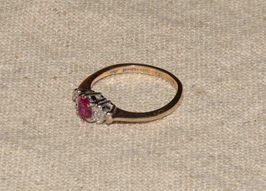 Ruby and diamond yellow gold cluster ring