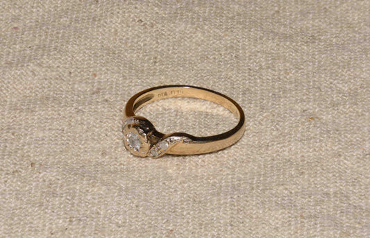 Yellow gold diamond solitaire ring