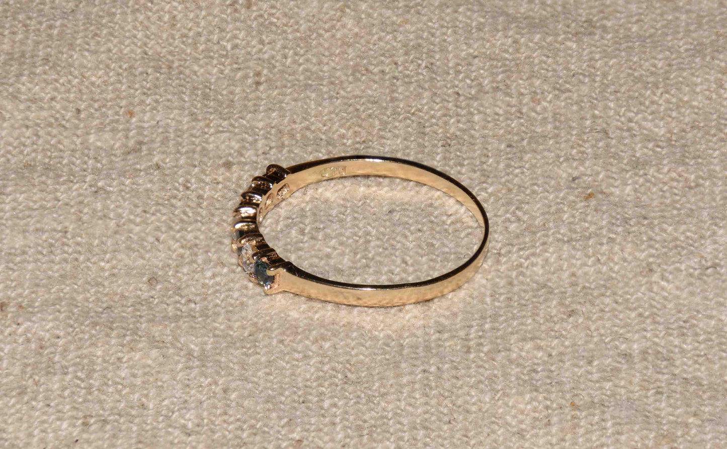 Saffier en zirkonia geelgoud row ring