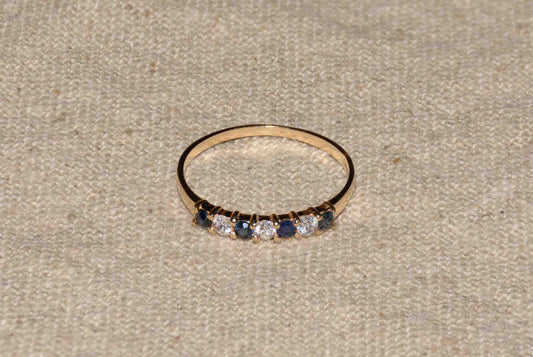 Saffier en zirkonia geelgoud row ring