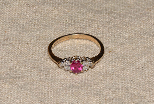 Ruby and diamond yellow gold cluster ring