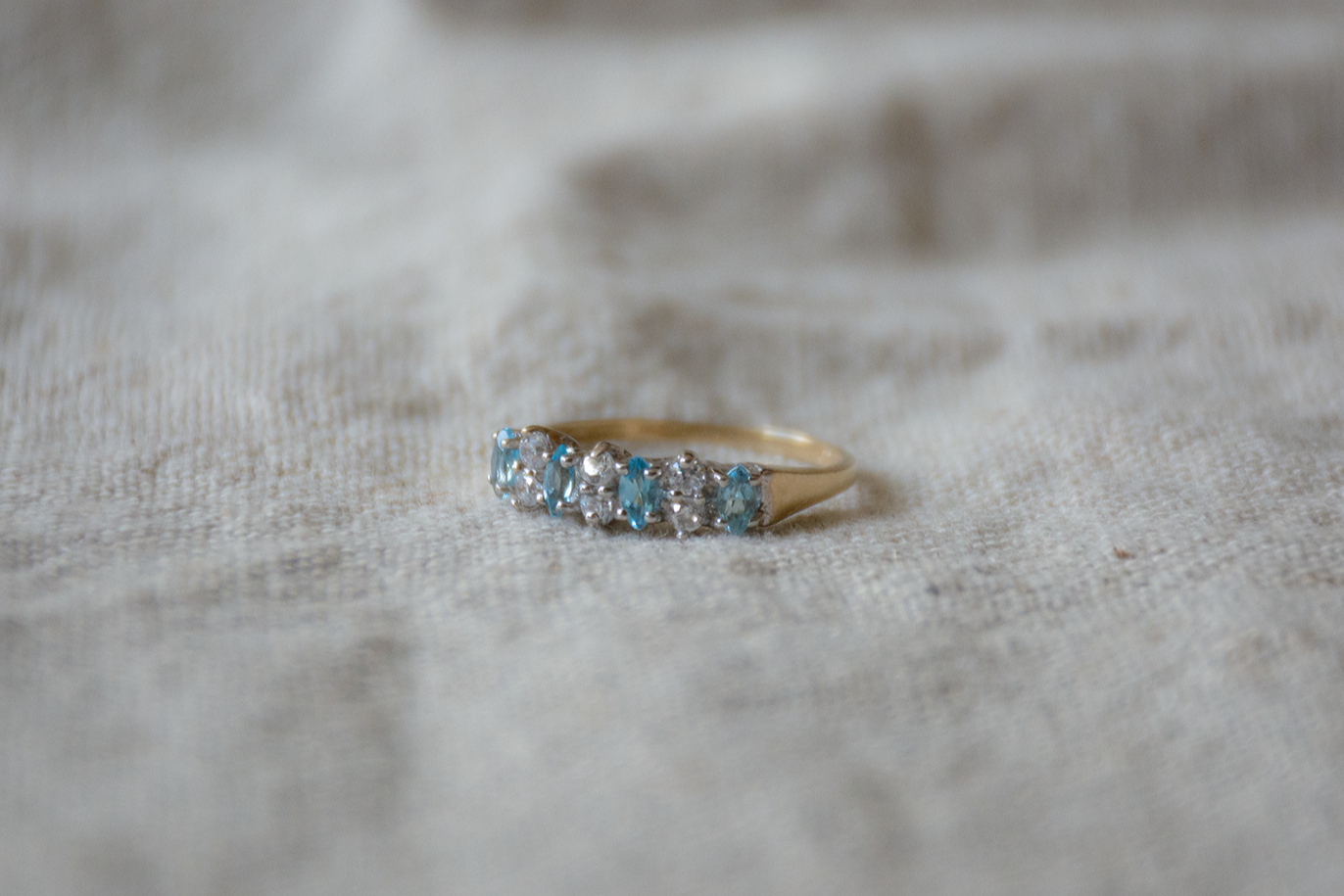 Topaas en zirkonia geelgoud/witgoud ring
