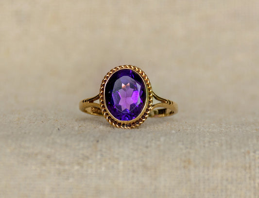 Amethyst yellow gold solitaire ring