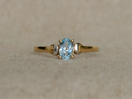 Topaas geelgoud/witgoud solitair ring
